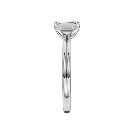 A side view of the Emerald cut diamond engagement ring in platinum with a plain band and solitaire setting