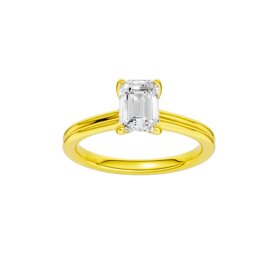 A front view of the Emerald cut diamond engagement ring in 14k yellow gold with a plain band and solitaire setting