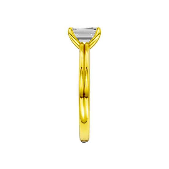 A side view of the Emerald cut diamond engagement ring in 14k yellow gold with a plain band and solitaire setting