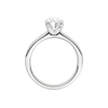 A profile view of the Oval cut diamond engagement ring in platinum with a plain band and solitaire setting
