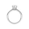 A profile view of the Pear cut diamond engagement ring in platinum with a plain band and solitaire setting