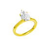 An angled view of the Pear cut diamond engagement ring in 14k yellow gold with a plain band and solitaire setting