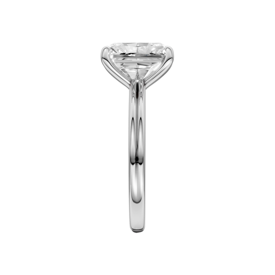 A side view of the Radiant cut diamond engagement ring in 14k white gold with a plain band and solitaire setting