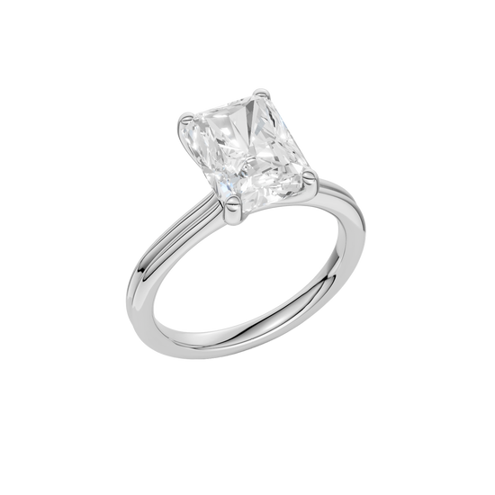 A three-quarter view of the Radiant cut diamond engagement ring in 14k white gold with a plain band and solitaire setting