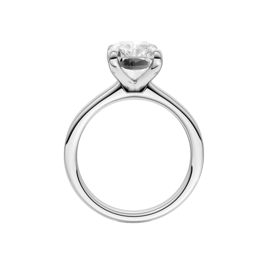 A profile view of the Radiant cut diamond engagement ring in 14k white gold with a plain band and solitaire setting