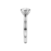 A side view of the Round cut diamond engagement ring in platinum with a plain band and solitaire setting