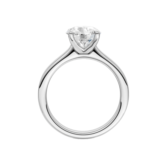 A profile view of the Round cut diamond engagement ring in platinum with a plain band and solitaire setting