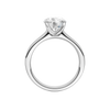 A profile view of the Round cut diamond engagement ring in platinum with a plain band and solitaire setting