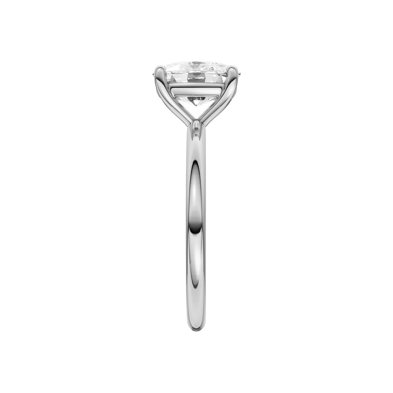 Side view of the Elongated cushion cut diamond engagement ring in platinum with a plain band and solitaire setting