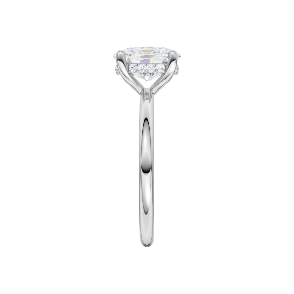 A side view of the Elongated cushion cut diamond engagement ring in platinum with a plain band and solitaire setting