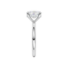 A side-on view of the white gold Provenance ring emphasizing its softly luminous take on minimalism and intentional, quietly luxe design.