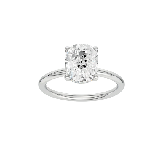 A front view of the Elongated cushion cut diamond engagement ring in platinum with a plain band and solitaire setting