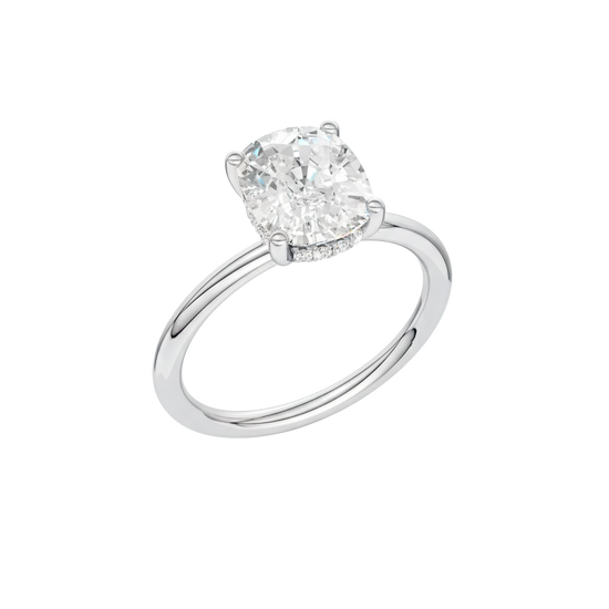A three-quarter view of the white gold Provenance ring showing the hidden halo that brings a little secret shimmer beneath the center stone.