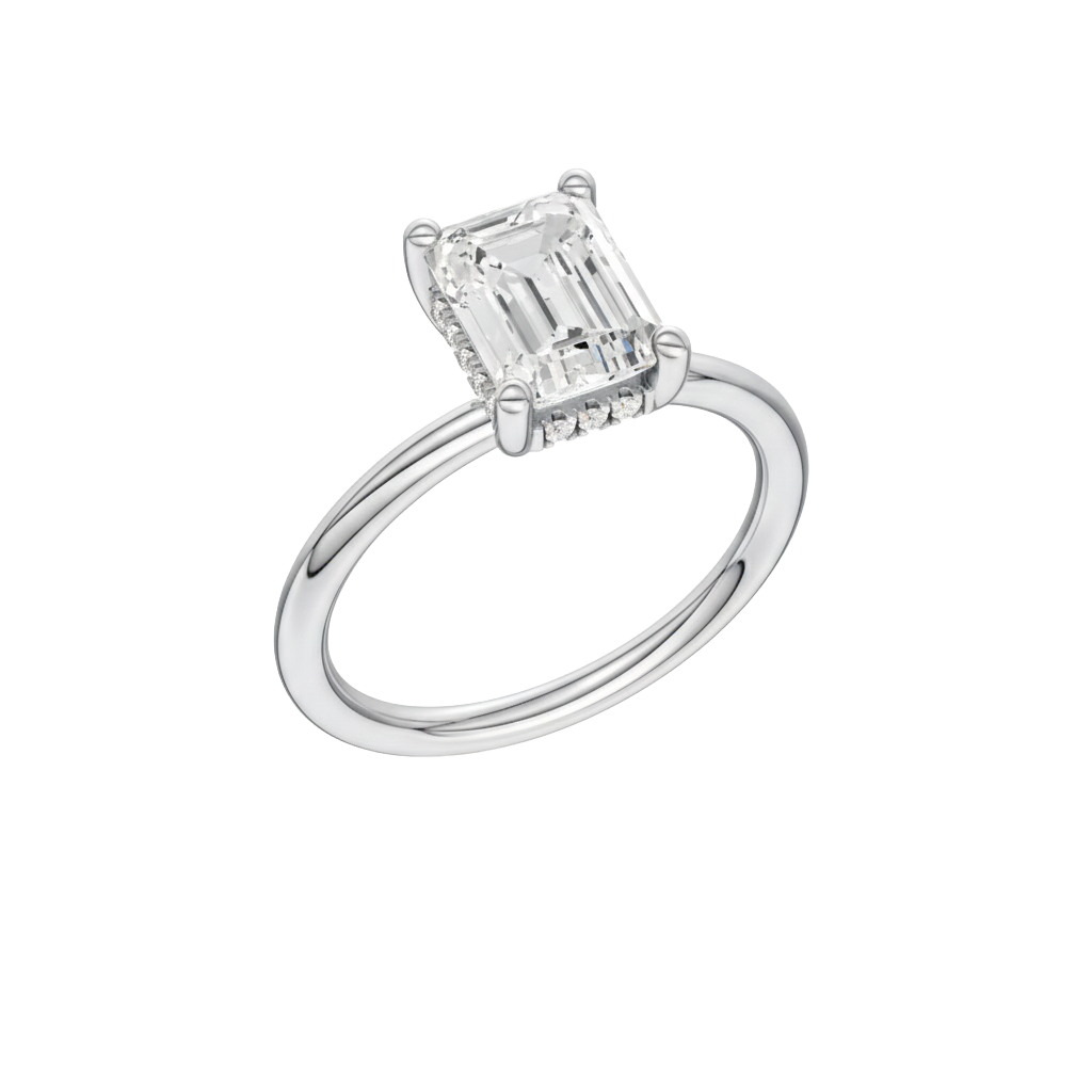 A three-quarter view of the Emerald cut diamond engagement ring in 14k white gold with a plain band and solitaire setting