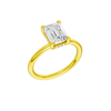 A three-quarter view of the Emerald cut diamond engagement ring in 14k yellow gold with a plain band and solitaire setting