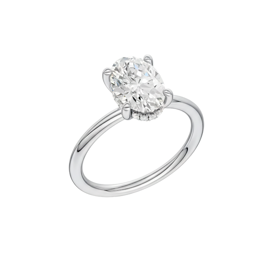 A three-quarter view of the Oval cut diamond engagement ring in platinum with a plain band and solitaire setting