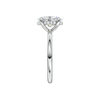 A side view of the Oval cut diamond engagement ring in platinum with a plain band and solitaire setting