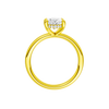A profile view of the Oval cut diamond engagement ring in 14k yellow gold with a plain band and solitaire setting