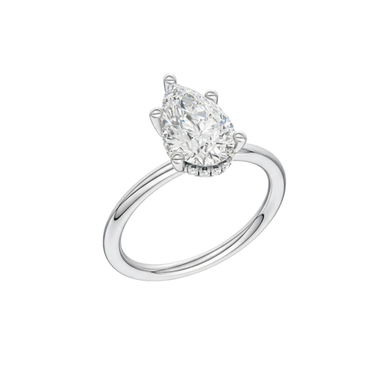A three-quarter view of the Pear cut diamond engagement ring in 14k white gold with a plain band and solitaire setting