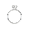 A profile view of the Pear cut diamond engagement ring in platinum with a plain band and solitaire setting