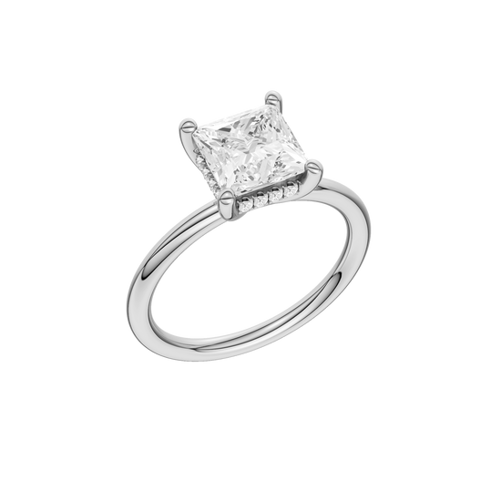 A three-quarter view of the Princess cut diamond engagement ring in platinum with a plain band and solitaire setting
