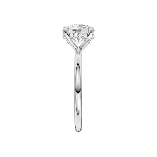 A side view of the Round cut diamond engagement ring in 14k white gold with a plain band and solitaire setting