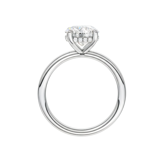 A profile view of the Round cut diamond engagement ring in 14k white gold with a plain band and solitaire setting