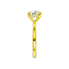 A side view of the Round cut diamond engagement ring in 14k yellow gold with a plain band and solitaire setting