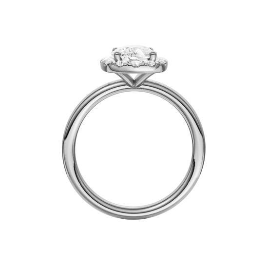 A profile view of the elongated cushion cut diamond engagement ring in 14k white gold with a plain band and solitaire setting