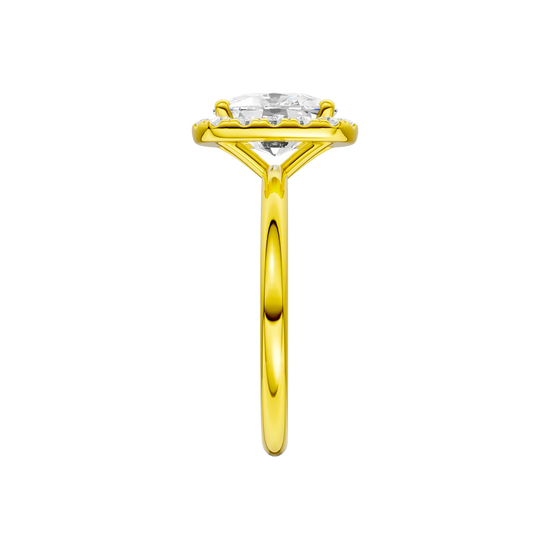 A side on view of the elongated cushion cut diamond engagement ring in 14k yellow gold with a plain band and solitaire setting