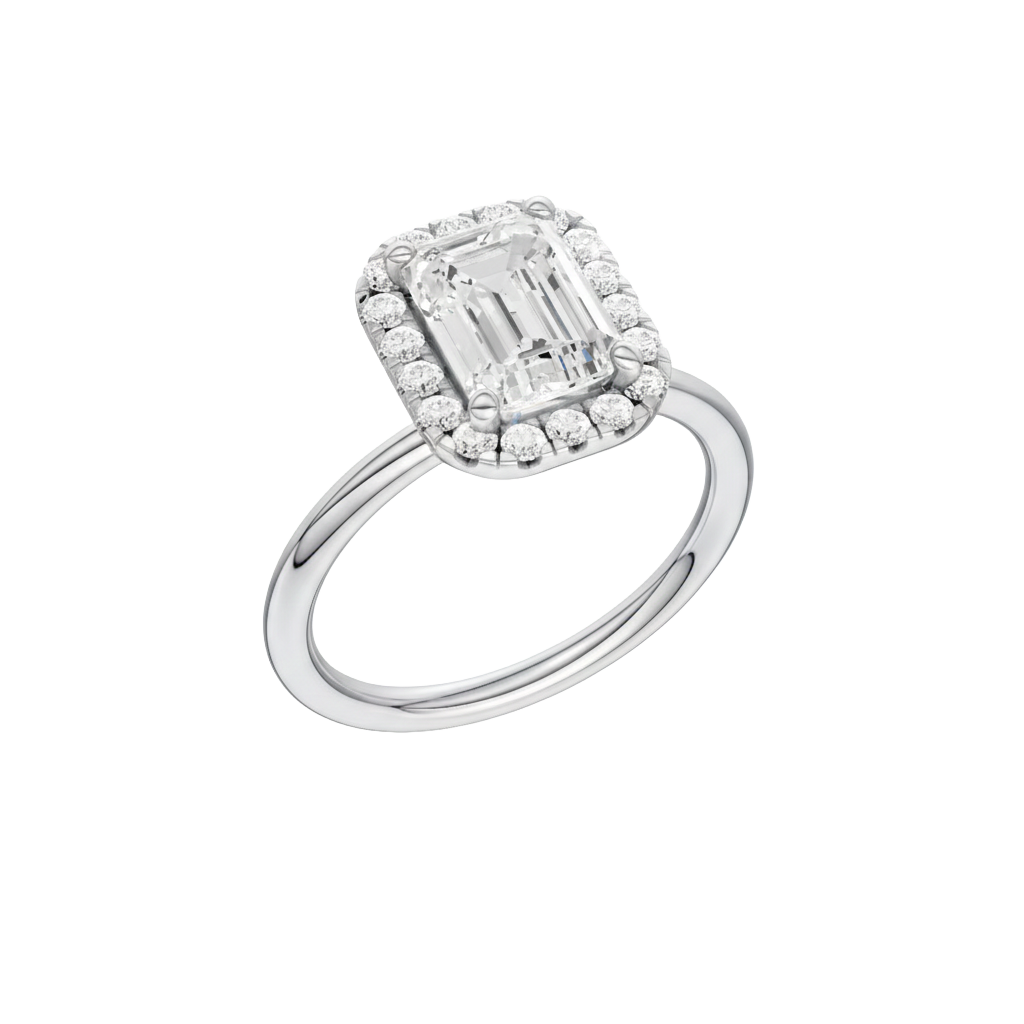 A three-quarter view of the Emerald cut diamond engagement ring in 14k white gold with a plain band and solitaire setting
