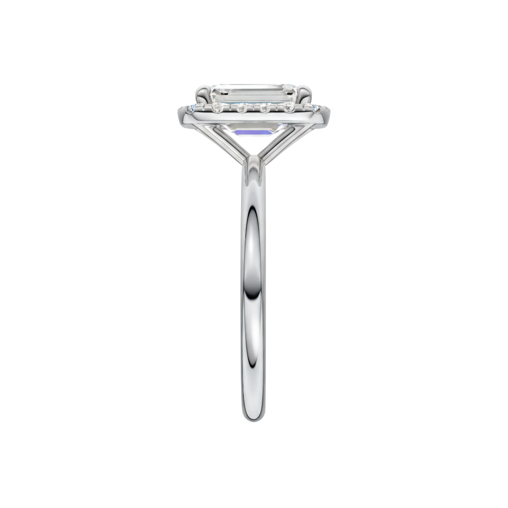 A side view of the Emerald cut diamond engagement ring in 14k white gold with a plain band and solitaire setting