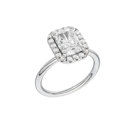 A three-quarter view of the Radiant cut diamond engagement ring in 14k white gold with a plain band and solitaire setting
