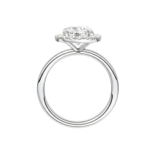 A profile view of the Round cut diamond engagement ring in platinum with a plain band and solitaire setting
