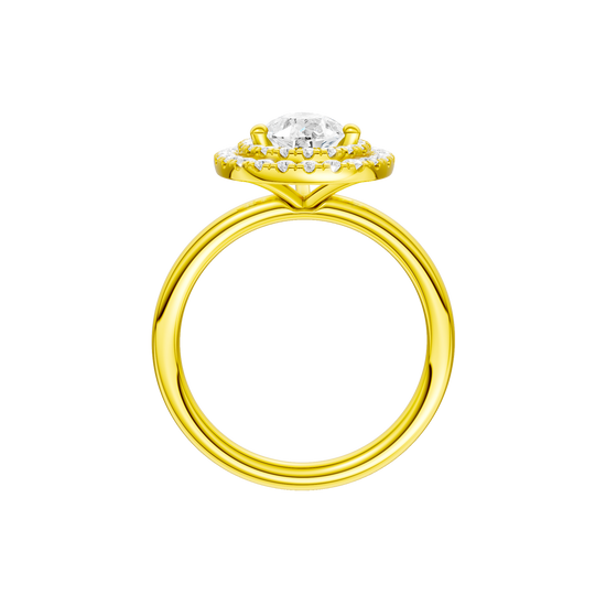A profile view of the Pear cut diamond engagement ring in 14k yellow gold with a plain band and solitaire setting