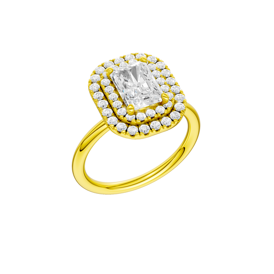 A three-quarter view of the Radiant cut diamond engagement ring in 14k yellow gold with a plain band and solitaire setting