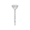 A side view of the Elongated Cushion cut diamond engagement ring in platinum with a pavé diamond band and cathedral setting