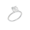 A three-quarter view of the Elongated Cushion cut diamond engagement ring in 14k white gold with a pavé diamond band and cathedral setting