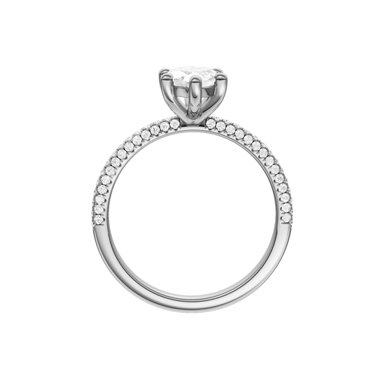 A profile view of the Marquise cut diamond engagement ring in 14k white gold with a pavé diamond band and cathedral setting