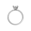 A profile view of the Marquise cut diamond engagement ring in 14k white gold with a pavé diamond band and cathedral setting