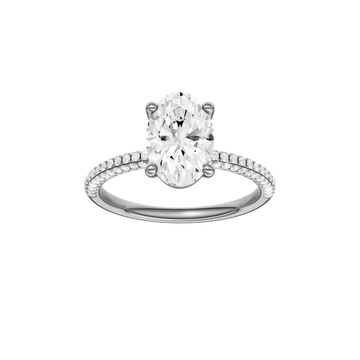 A front view of the oval cut diamond engagement ring in 14k white gold with a pavé diamond band and cathedral setting