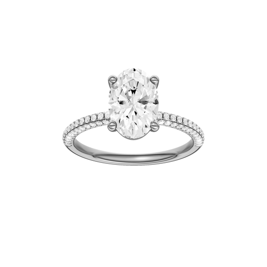 A front view of the oval cut diamond engagement ring in 14k white gold with a pavé diamond band and cathedral setting