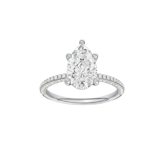 A front view of the Pear cut diamond engagement ring in 14k white gold with a pavé diamond band and cathedral setting