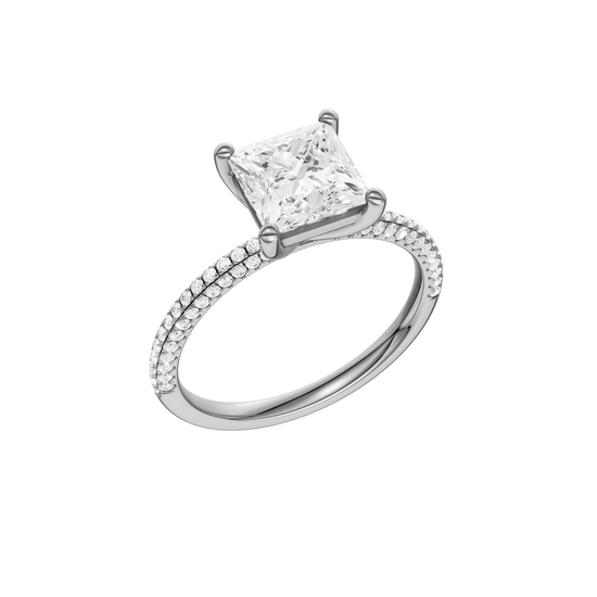 A three-quarter view of the Princess cut diamond engagement ring in 14k white gold with a pavé diamond band and cathedral setting