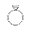 A profile view of the Princess cut diamond engagement ring in platinum with a pavé diamond band and cathedral setting