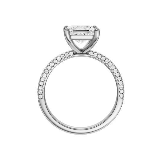 A profile view of the Princess cut diamond engagement ring in 14k white gold with a pavé diamond band and cathedral setting