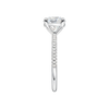 A side view of the Round cut diamond engagement ring in 14k white gold with a pavé diamond band and cathedral setting