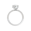A profile view of the Round cut diamond engagement ring in platinum  with a pavé diamond band and cathedral setting
