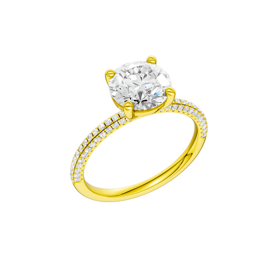 A three-quarter view of the Round cut diamond engagement ring in 14k yellow gold with a pavé diamond band and cathedral setting