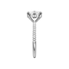 A side view of the Elongated cushion cut diamond engagement ring in 14k white gold with a pavé diamond band and cathedral setting